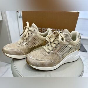 Elegant Cestfini Gold Women's Wedge Sneakers